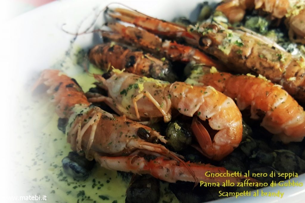 Gnocchetti al nero di seppia, panna allo zafferano di Gubbio, scampetti al brandy